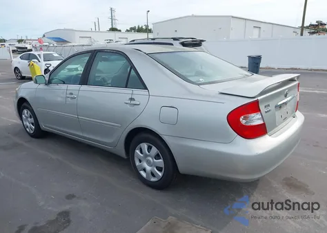 2002 Toyota Camry Le from USA, damaged, VIN 4T1BE32K82U522019